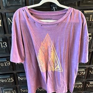 Oversized concert tee purposefully torn